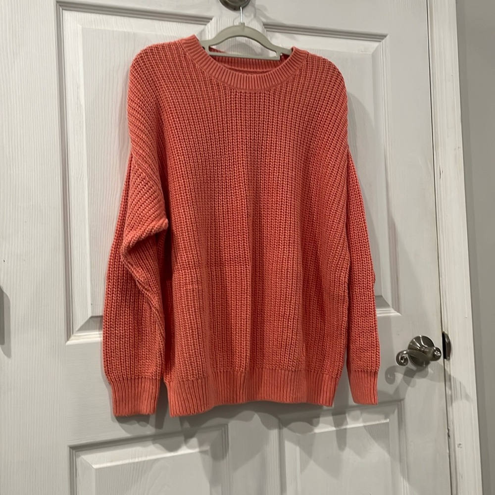 NWOT women’s sweater sz 0X. Perfect for fall and winter. Color is salmon.
